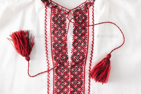 Ukrainian embroidery. Traditional national embroidery on clothes with red, black and white threads.