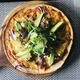 Overhead of pizza with lettuce and avocado on a wood plate  - PhotoDune Item for Sale