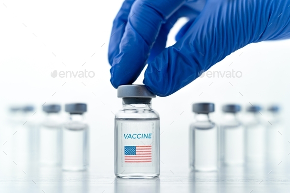Transparent vials with USA,american flag.Vaccine for covid-19 coronavirus,flu,infectious diseases. H