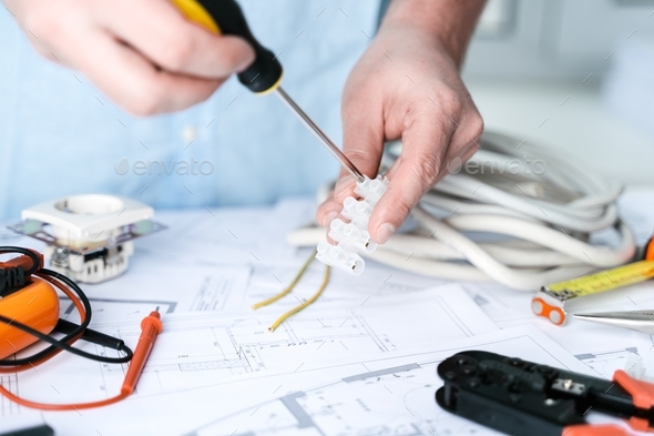 Man Repairer Making Electricity Project In House.Repairs Planning ...