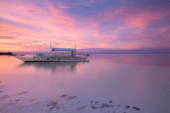 Pink sunset over the ocean, Philippines  - Stock Photo - Images