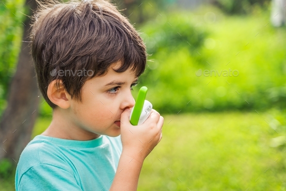 Small boy,kid,child play in walkie-talkie.Walkie Talkies with channels ...