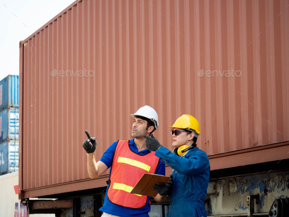 Foreman engineer african male hat white yellow blue red safety talk look report notebook tablet comp - Stock Photo - Images
