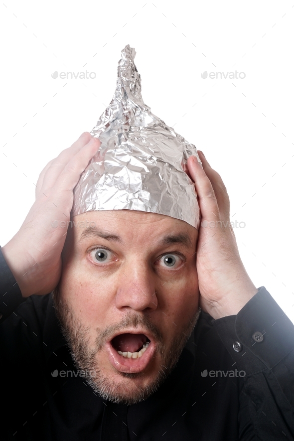 paranoid man wearing tin foil hat