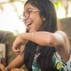 Candid pic of a happy young girl enjoying her breakfast at a restaurant - PhotoDune Item for Sale