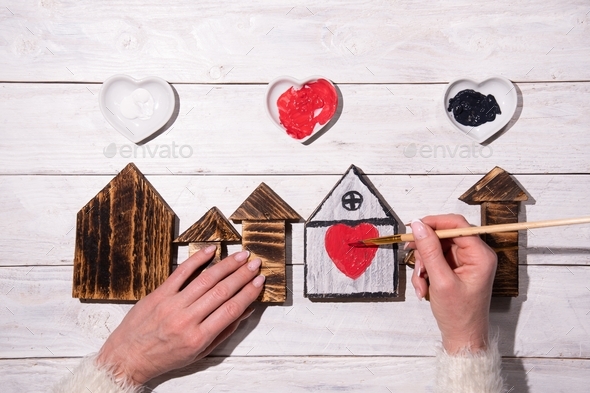 crafting, step by step instructions how to make decor for valentine\'s day, female hands draw a heart