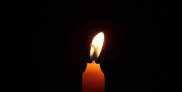 Video Of A Burning Candle With Black Background