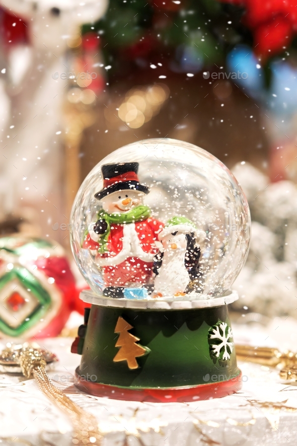 Magic crystals ball with snowman