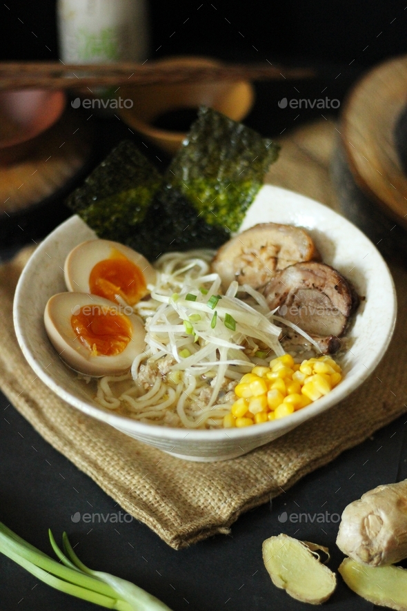 Miso ramen soup on the table with products and sauces for cooking Japanese cultural food