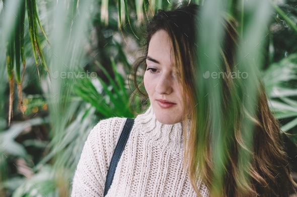 Woman Inside A Green House Surrounded By Plants Stock Photo By Deea