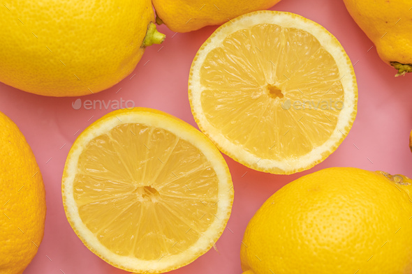 Lemon lay flat on a pink background Stock Photo by Lemnaouer | PhotoDune