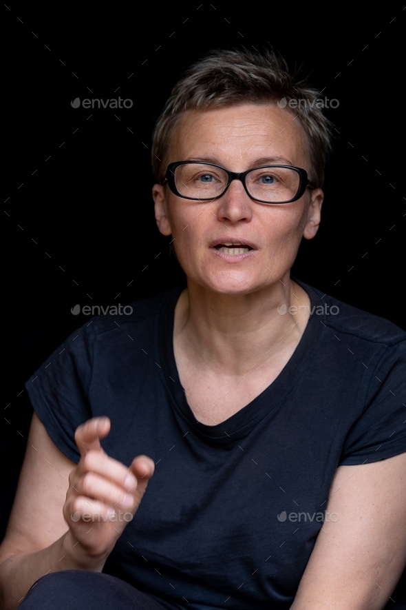 Portrait Of Caucasian Woman With Short Haircut And Black Rimmed Glasses