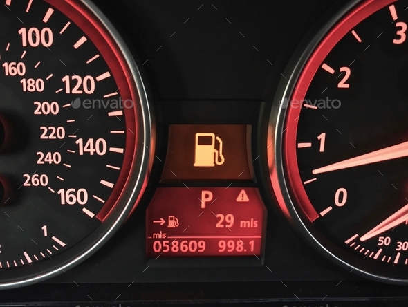 Gasoline petrol gas light on interior dashboard in car