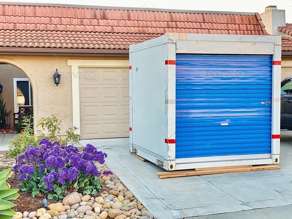 Home storage pod box in a driveway of a home in a residential neighborhood keeping safe and secure