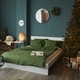 bedroom interior decorated with Christmas cozy decor and a Christmas tree. - PhotoDune Item for Sale