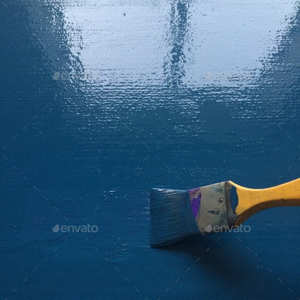 Paint brush painting surface area blue