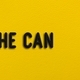 “She can” on yellow leather background - PhotoDune Item for Sale