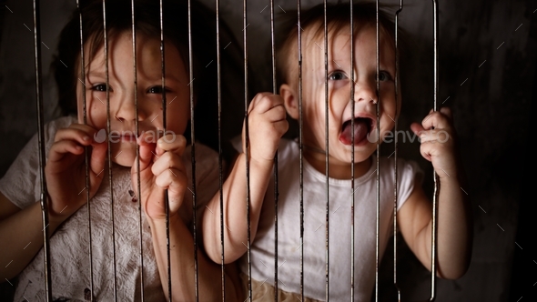 Children in a cage, the concept of restriction of freedom and violation of the rights of the child