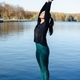 girl doing outdoor exercises near the lake - PhotoDune Item for Sale