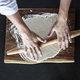 chef&#39;s hands rolling dough and flour with a rolling pin - PhotoDune Item for Sale