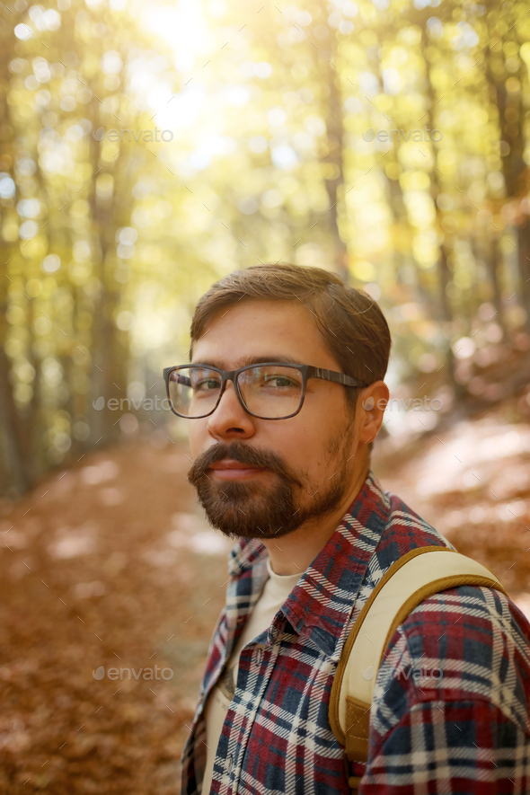 Caucasian male model outdoors in nature. Stock Photo by seleznev_photos