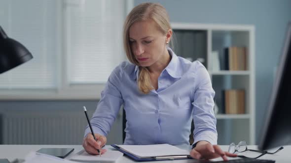 Woman Working at Office