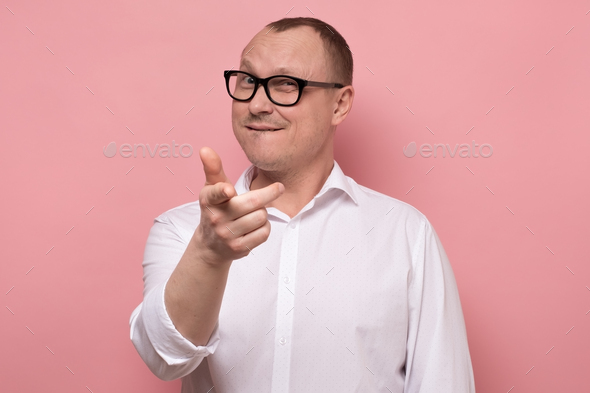 Handsome businessman pointing at you selecting for crowd. You are the best