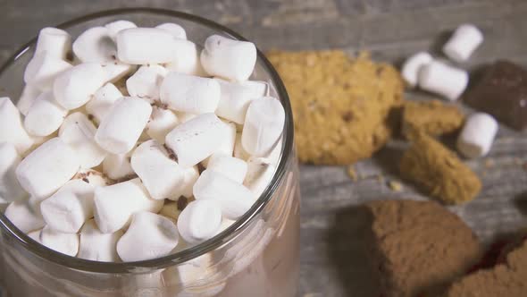 Marshmallow in a Mug with a Drink Sprinkle with Chocolate