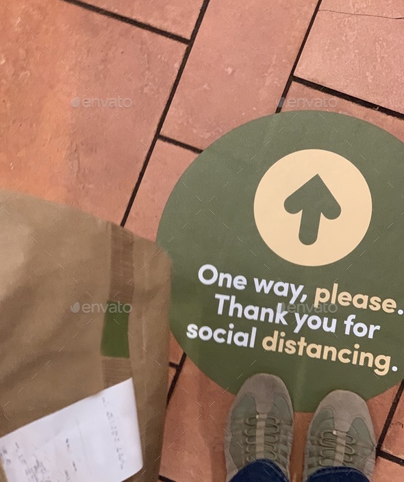 One way please. Thank you for social distancing sign at restaurant’s floor to keep social distancing