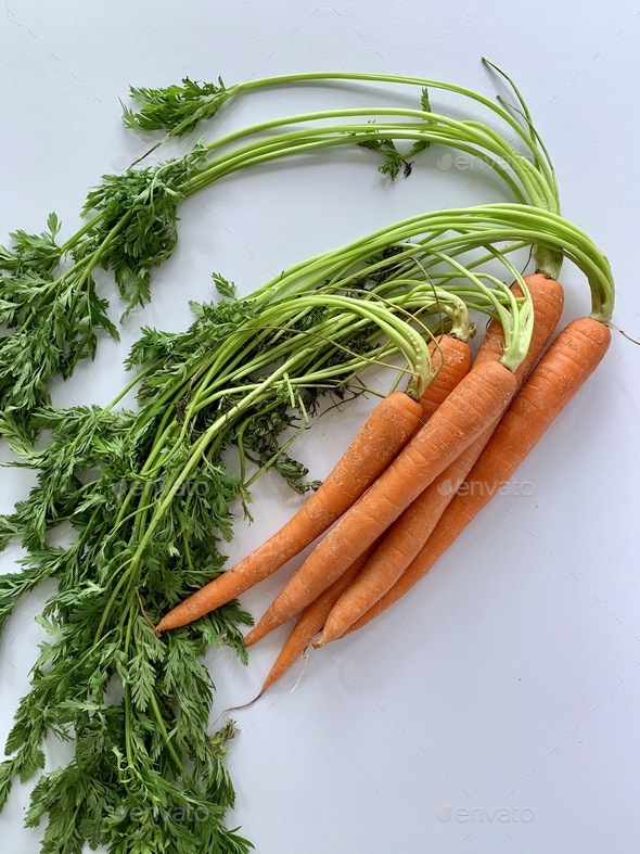 Overhead of fresh carrots. Natural ‘ healthy food. Minimalism. Stock