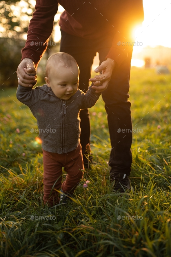 Father and his son meet the dawn. Fatherly love. The relationship