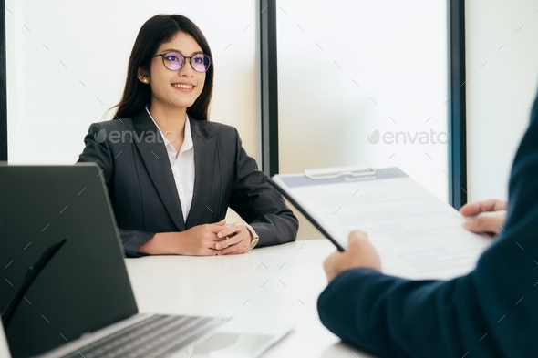 Confident businessman in a job interview with a corporate personnel manager.
