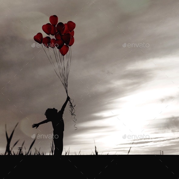 Little boy holding balloons. Your mine Never let you go. I Promise you my love. Balloons in the air