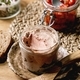 Glass jar of homemade chicken liver pate with sliced rye bread - PhotoDune Item for Sale