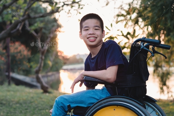 Disabled child on wheelchair smile,happy,playing,learning,exercise in ...