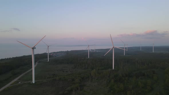 Wind turbine on sunset