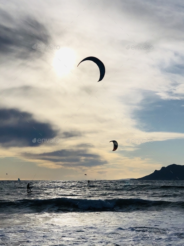 Kite surfers at Cannes sunset  - Stock Photo - Images