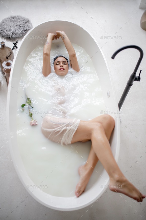 Girl in a Bath with Foam, People Stock Footage ft. bath & bathtub - Envato  Elements