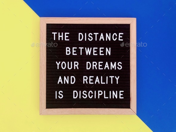 The distance between your dreams and reality is discipline. Quote. Quotes. - Stock Photo - Images