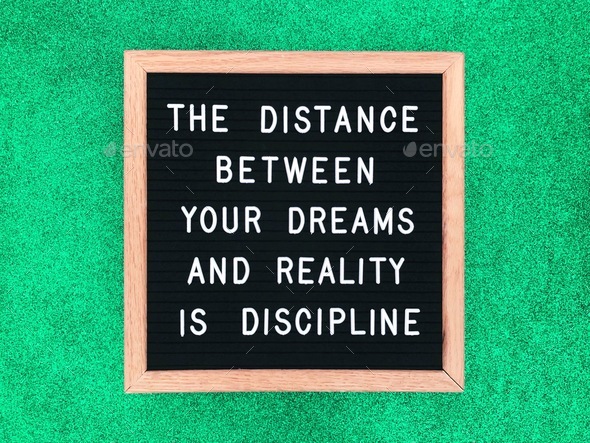 The distance between your dreams and reality is discipline. Quote. Quotes. - Stock Photo - Images