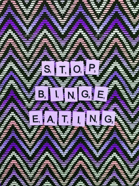 Stop binge eating. - Stock Photo - Images