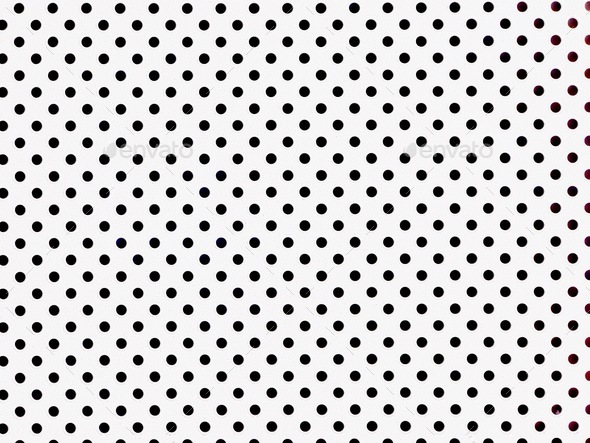 White and black polka dots background