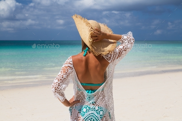 ⭐️⭐️⭐️ Nominated ⭐️⭐️⭐️ Stylish woman from behind in straw hat