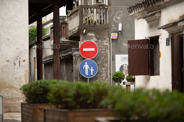 Road sign: road up, pedestrian zone in old town