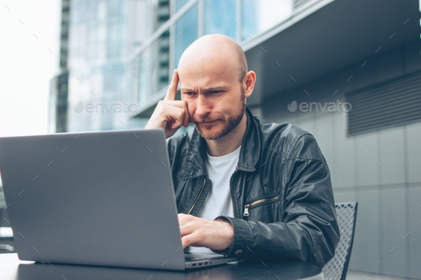 Thinking Attractive Adult Successful Bald Bearded Man In Black Jacket