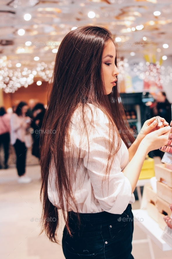 The Beautiful Long Hair Asian Girl Young Woman In Shop Supermarket Of Cosmetics Perfumes Duty 5963