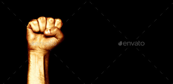 Male hand clenched into a fist. The black life of matter. the human rights of blacks in America.