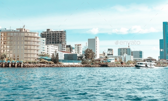 sea view of Male city of the capital of the Maldives and skyscrapers, transfer from the airport