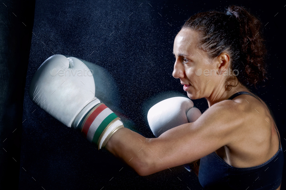 Female fighter with boxing gloves