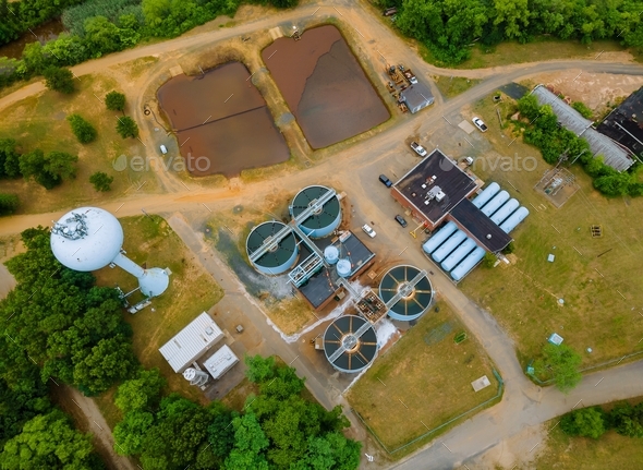 Aerial view of sewage treatment plant water tanks in the wastewater treatment processing after plant